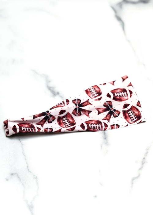 headband with footballs and bows