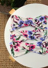 White twisted headwrap with pink blue floral print